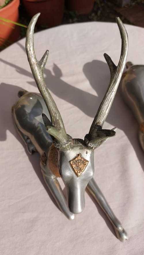 RARE SET OF 2 VINTAGE PEWTER AND BRASS RECLINING STAG REINDEER BOOKENDS