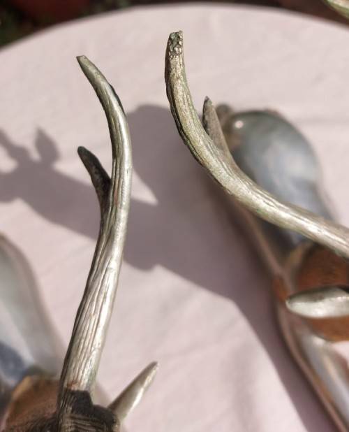 RARE SET OF 2 VINTAGE PEWTER AND BRASS RECLINING STAG REINDEER BOOKENDS