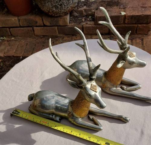RARE SET OF 2 VINTAGE PEWTER AND BRASS RECLINING STAG REINDEER BOOKENDS