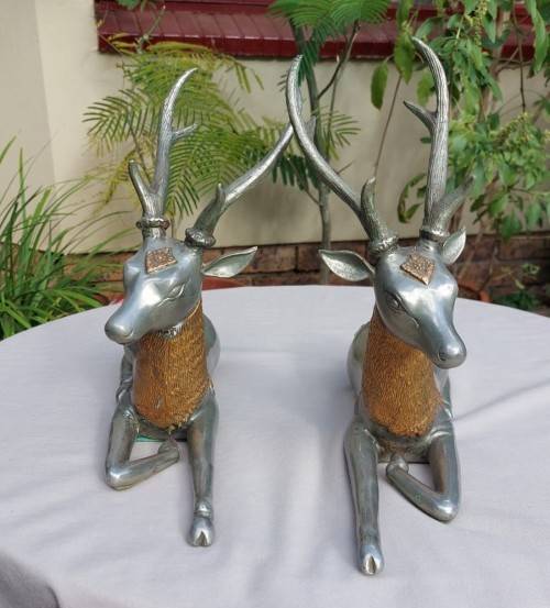 RARE SET OF 2 VINTAGE PEWTER AND BRASS RECLINING STAG REINDEER BOOKENDS