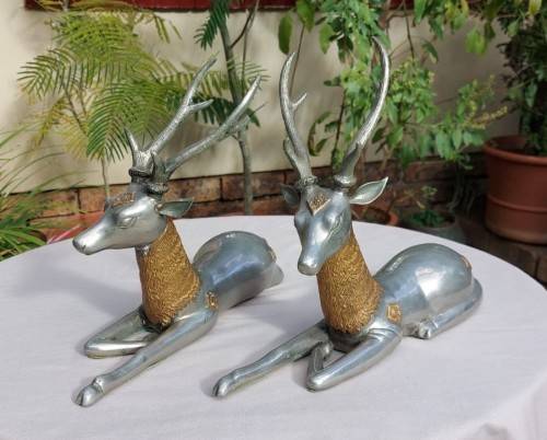 RARE SET OF 2 VINTAGE PEWTER AND BRASS RECLINING STAG REINDEER BOOKENDS