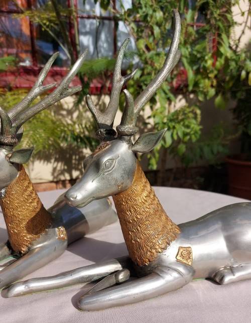 RARE SET OF 2 VINTAGE PEWTER AND BRASS RECLINING STAG REINDEER BOOKENDS