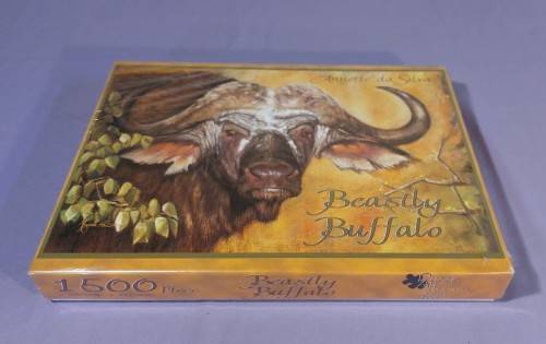 TWO PUZZLE BOXES  1500 PIECE BEASTLY BUFFALO  500 PIECE ISLAND OCEAN SCENE