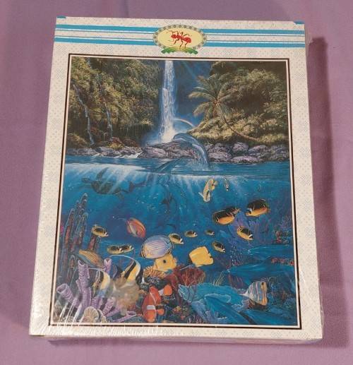 TWO PUZZLE BOXES  1500 PIECE BEASTLY BUFFALO  500 PIECE ISLAND OCEAN SCENE