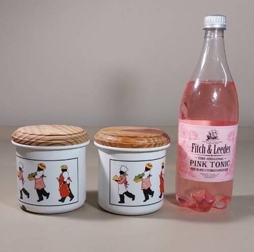 PAIR OF DECORATED ENAMEL SUGAR OR BISCUIT CONTAINERS WITH WOODEN LIDS