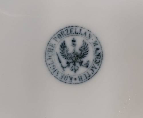 ANTIQUE (1847-1849) GERMAN KPM CUP AND SAUCER WITH RARE EAGLE AND SCEPTER MARK IN SHADES OF PURPLE