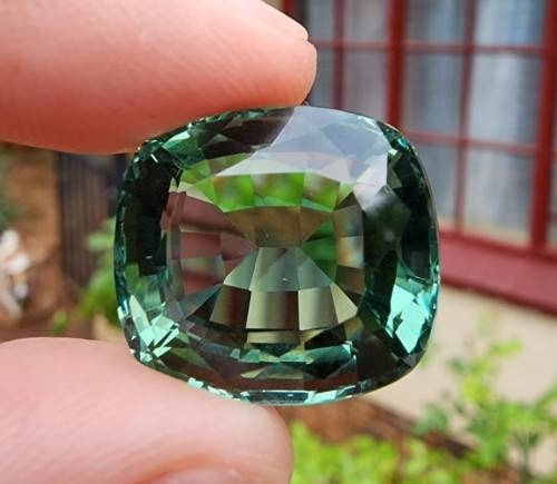 HOW STRANGE? A VERY LARGE 26,80CT GREEN AMETHYST GEMSTONE WITH BEAUTIFUL CUSHION CUT