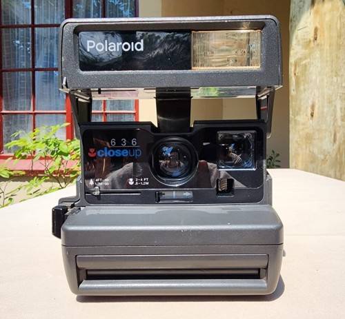 POLAROID 636 CLOSE-UP INSTANT CAMERA BOXED WITH OLD FILM CARTRIDGE AND TWO EXPOSED FILM SLIDES