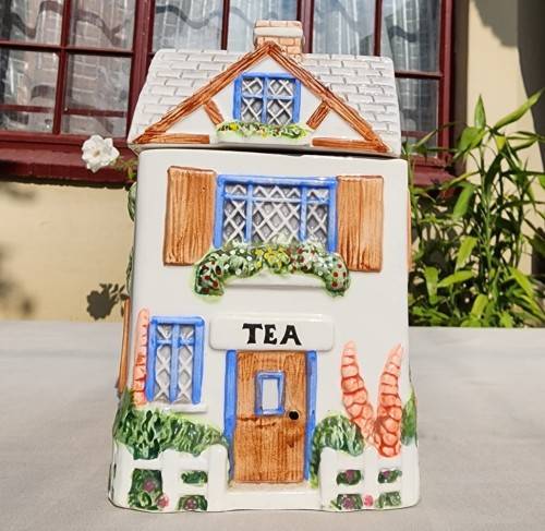 THE VILLAGE COLLECTABLE HAND PAINTED CERAMIC TEA CANNISTER DESIGNED BY ANNIE ROWE