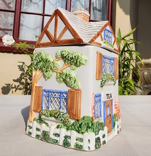 THE VILLAGE COLLECTABLE HAND PAINTED CERAMIC TEA CANNISTER DESIGNED BY ANNIE ROWE