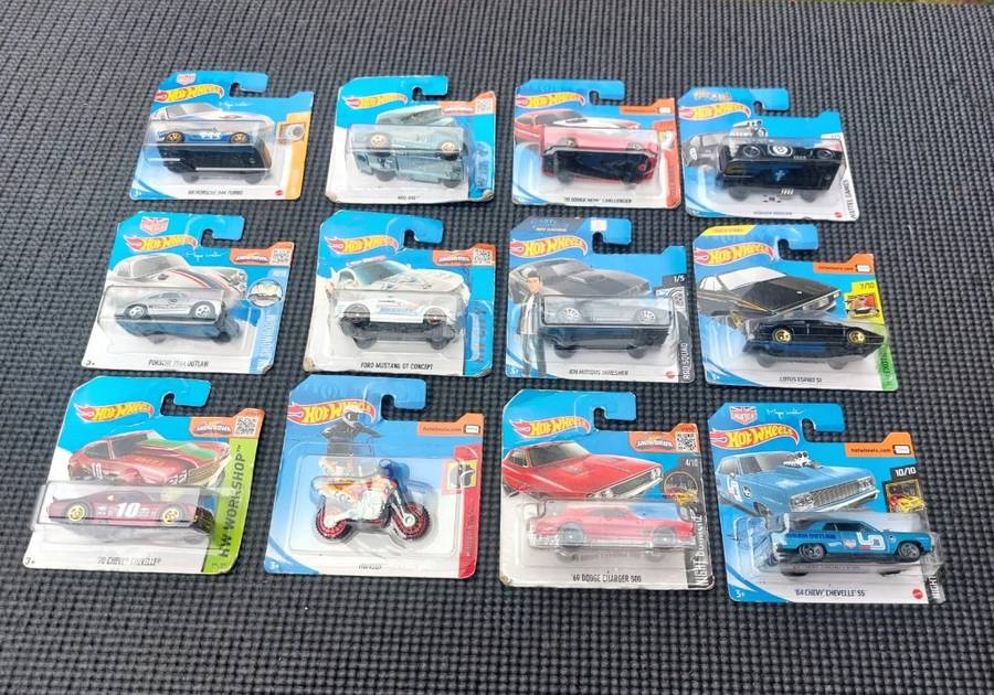 HOTWHEELS COLLECTION OF 12 DIECASTS IN ORIGINAL PACKAGING EARLY 2000 TO 2017 MODELS