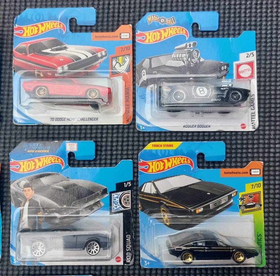 HOTWHEELS COLLECTION OF 12 DIECASTS IN ORIGINAL PACKAGING EARLY 2000 TO 2017 MODELS