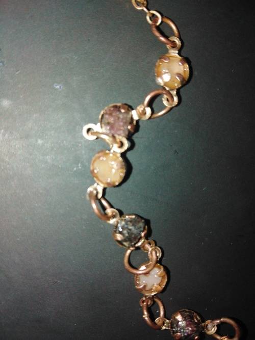 Rose gold natural rough diamond set