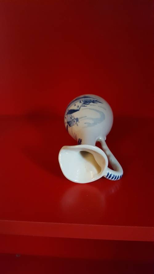 Lucia ware, Bud vase. Hand Painted in Delft Blue. Signed by the Artist.