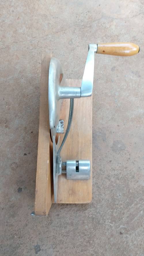 Very old wooden bread slicer