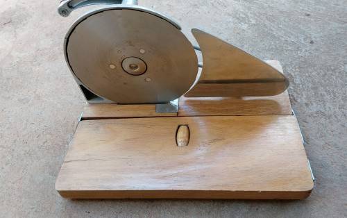 Very old wooden bread slicer