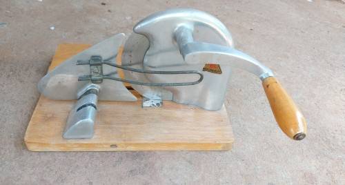 Very old wooden bread slicer