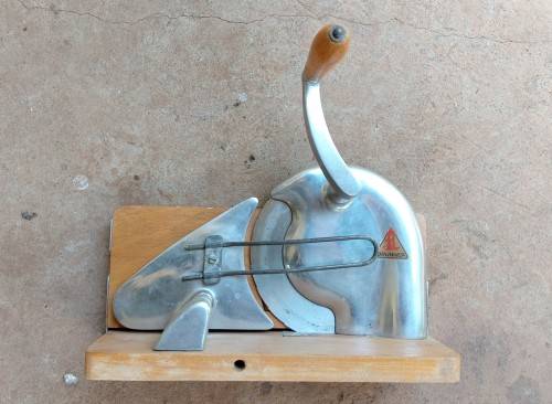 Very old wooden bread slicer