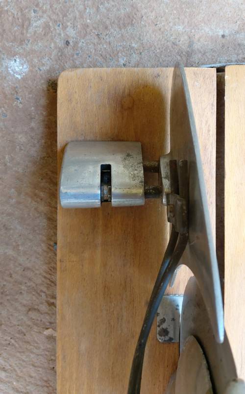 Very old wooden bread slicer