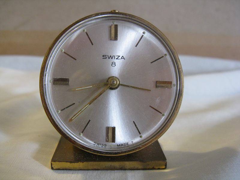VINTAGE TICKING SWISS MADE METAL WIND-UP SWIZA 8 MANTEL CLOCK. D 5.5cm.