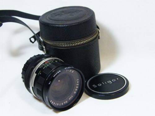 Soligor 1:2.8 28mm lens with pouch - as per photo