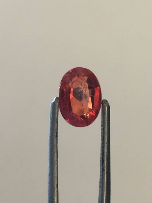 Dark orange Sapphire oval with inclusions - 1.92ct