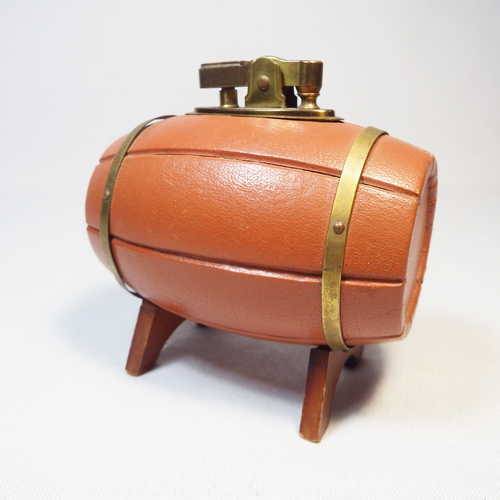 Leather clad barrel shaped table lighter