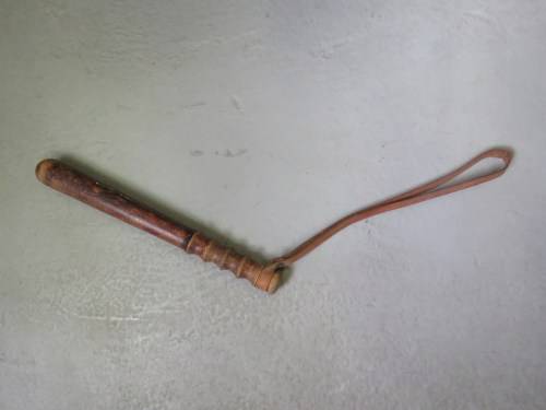 Old wooden military police baton