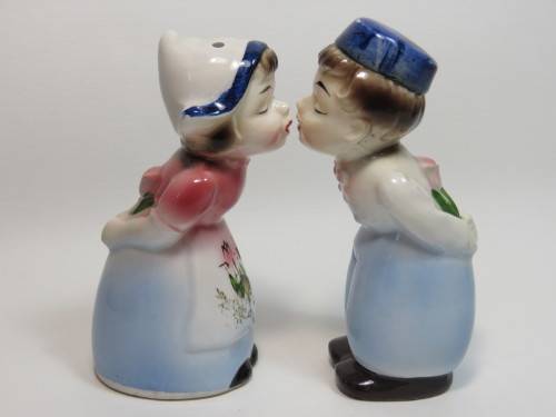 Pair of Dutch kissing couple salt and pepper shakers