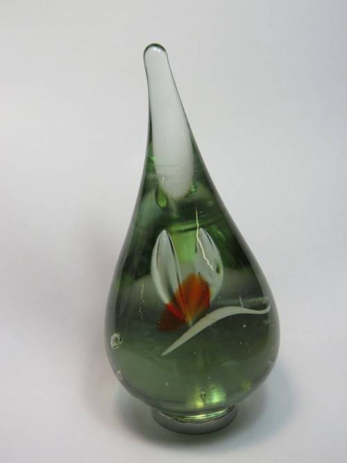 Hand blown glass paperweight with metal footpiece