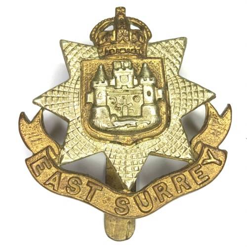 East Surrey regiment cap badge with slide - crown