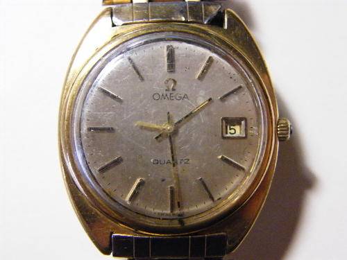 Omega Quartz mens wristwatch, not working and with incorrect strap