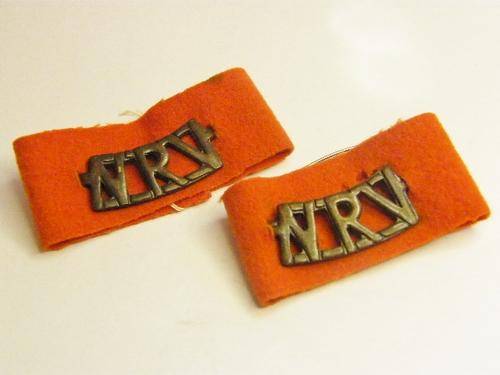 NRV ( National Reserve Volunteers ) shoulder Title Pair on red background - as per photo