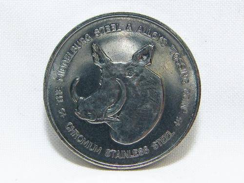 Middelburg Steel & Alloys tossing coin with warthogs - as per photo