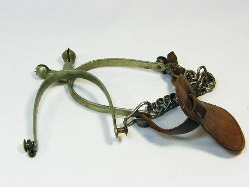 Lot of 2 different solid nickel cavalry boot spurs - swan neck type and Waterford type with leather