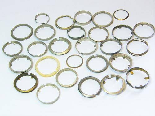 Lot of 26 vintage watch movement rings - as per photo
