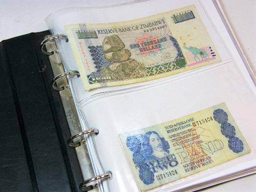 Banknote album filled with 30 banknotes - as per photo