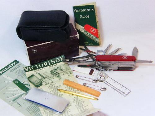 Victorinox Swiss Champ survival knife with multiple functions - unused in box & leather pouch