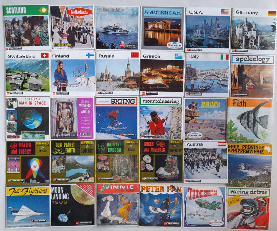 30 View-Master Slides with two viewers and original warranty document for collectors.