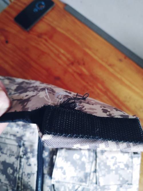 Paintball body armour with pod pack