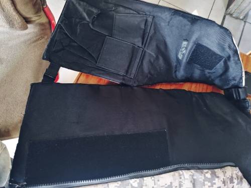 Paintball body armour with pod pack