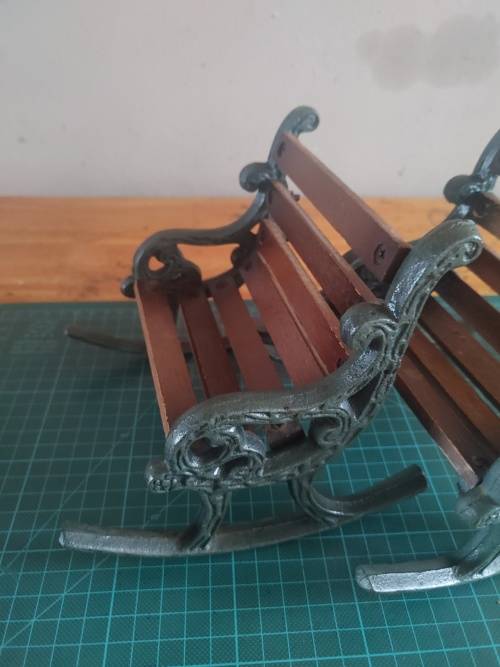 Antique miniature Cast iron &wood slays rocking chair