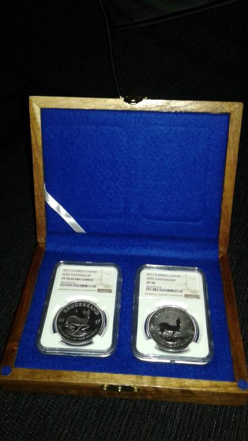2 x 2017 SILVER KRUGERS...1 PROOF AND 1 UNCIRCULATED,IN KIAAT DISPLAY CASE...BOTH PERFECT COINS!!!