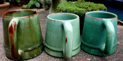THREE BEAUTIFUL GREEN POTTERY TANKARDS