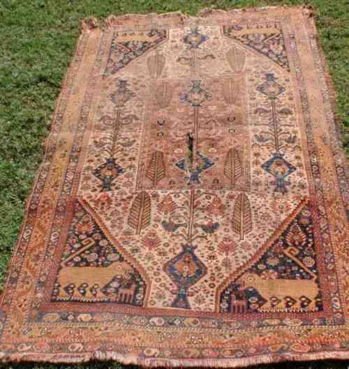 WORN OUT OLD HAND WOVEN CARPET - A BEAUTY IN ITS DAY NOW A REMNANT OF OLD PERSIA - CHARACTER PIECE!