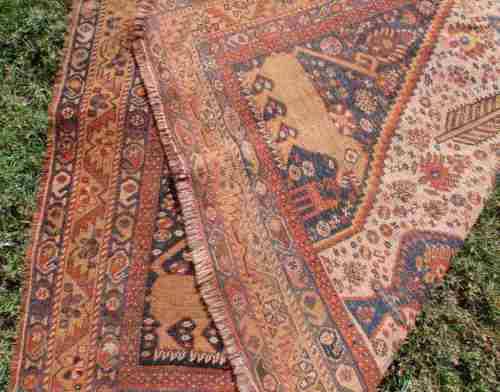 WORN OUT OLD HAND WOVEN CARPET - A BEAUTY IN ITS DAY NOW A REMNANT OF OLD PERSIA - CHARACTER PIECE!