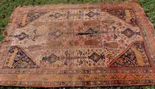 WORN OUT OLD HAND WOVEN CARPET - A BEAUTY IN ITS DAY NOW A REMNANT OF OLD PERSIA - CHARACTER PIECE!