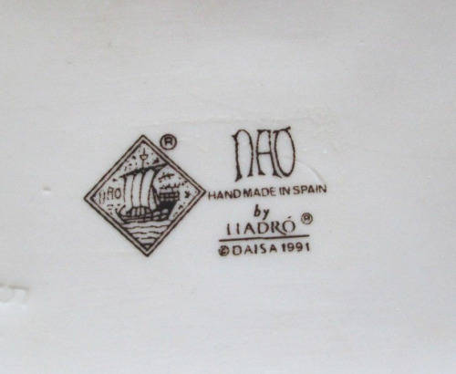 Lladro Nao Daisa Porcelain Figurine Girl Playing with Doll on Armchair Chair
