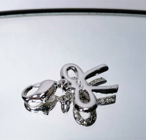 Genuine Swarovski Charm Bracelet Clip On Charm - Bow.   #
