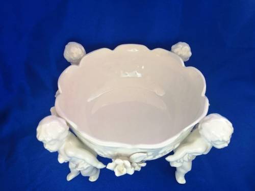 Beautiful White Italian Continental blanc de Chine center bowl depicting four putti Cherubs